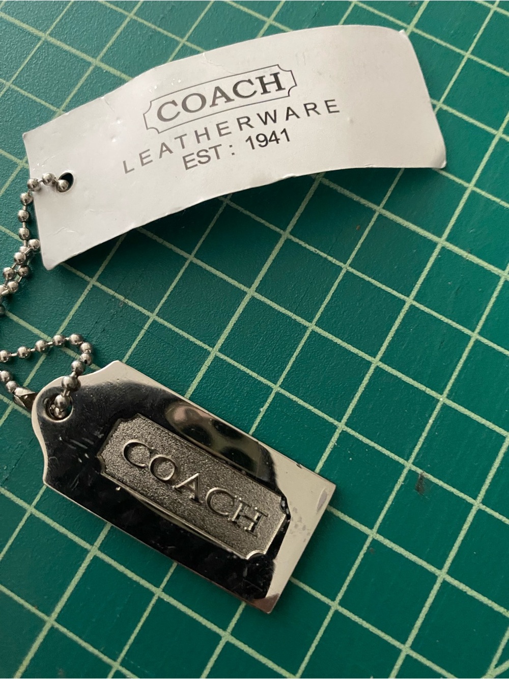 Vintage Coach metal hang tag bag charm